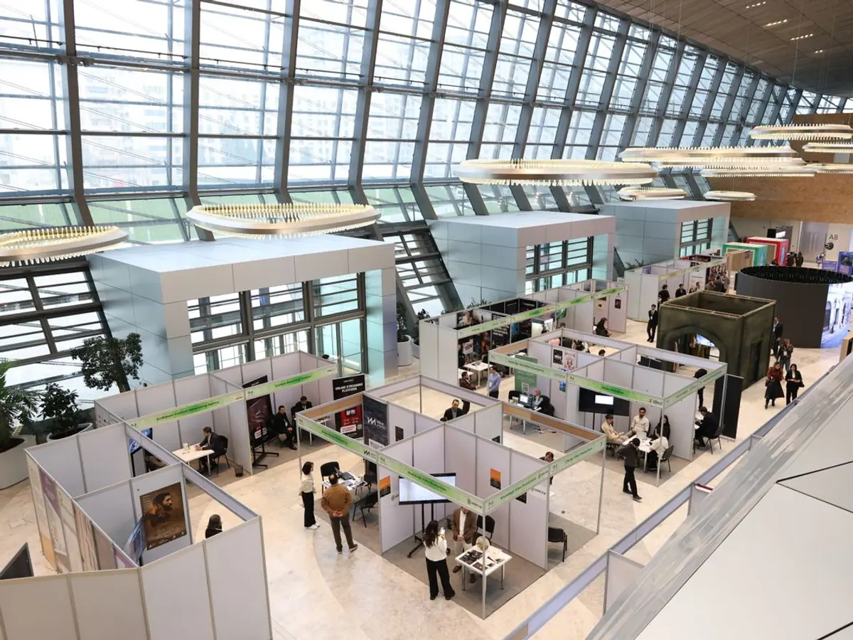 Trade show floor inside an exhibition hall